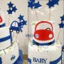 Torta pannolini Baby Boy: tre piani di pannolini Huggies Unistar Misura 3.